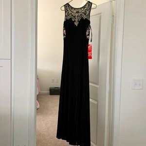 Black gown with sequins.